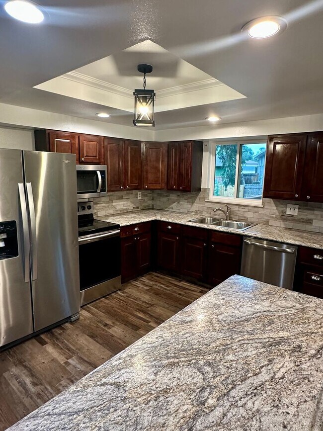 Building Photo - Updated Split-Level Gem | 5BD, 3BA | Large...