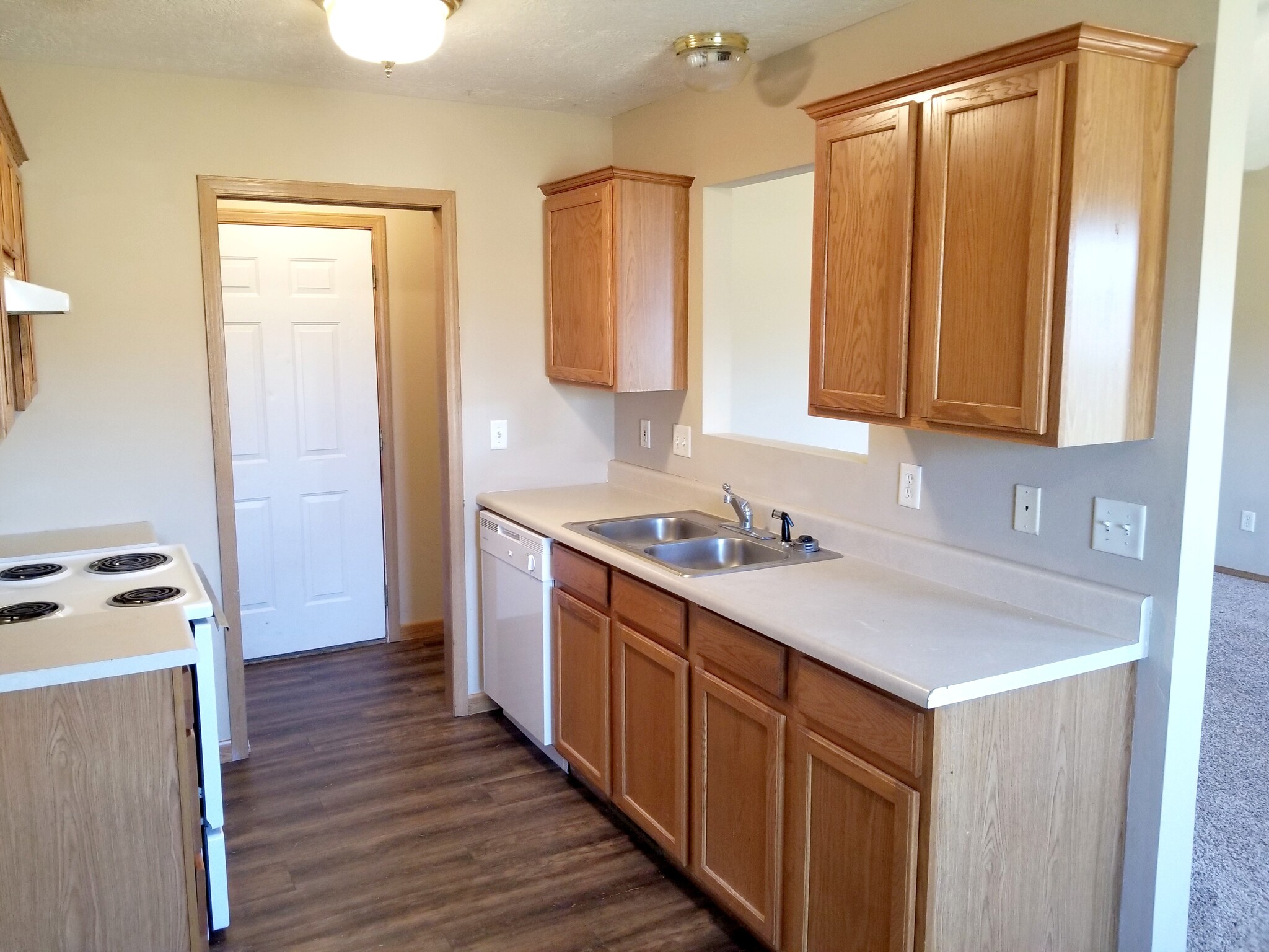 Kitchen and Laundry area off the garage. - 819 N Pinewood Ave