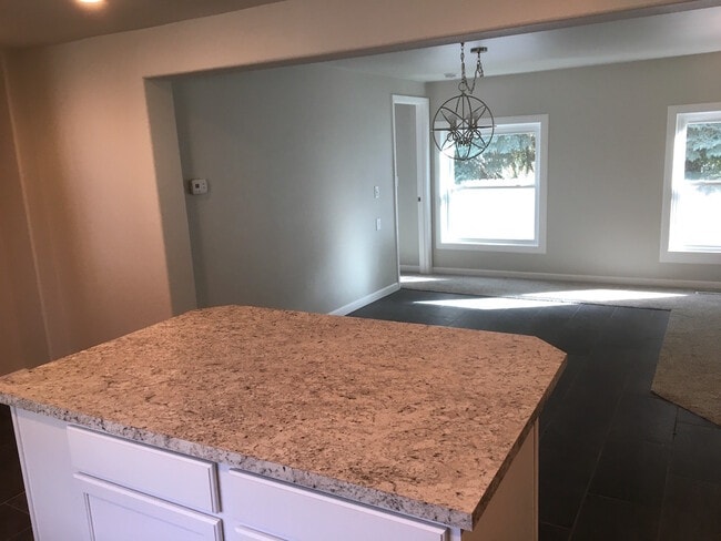 Building Photo - 4 bedroom, 2 bath Home
