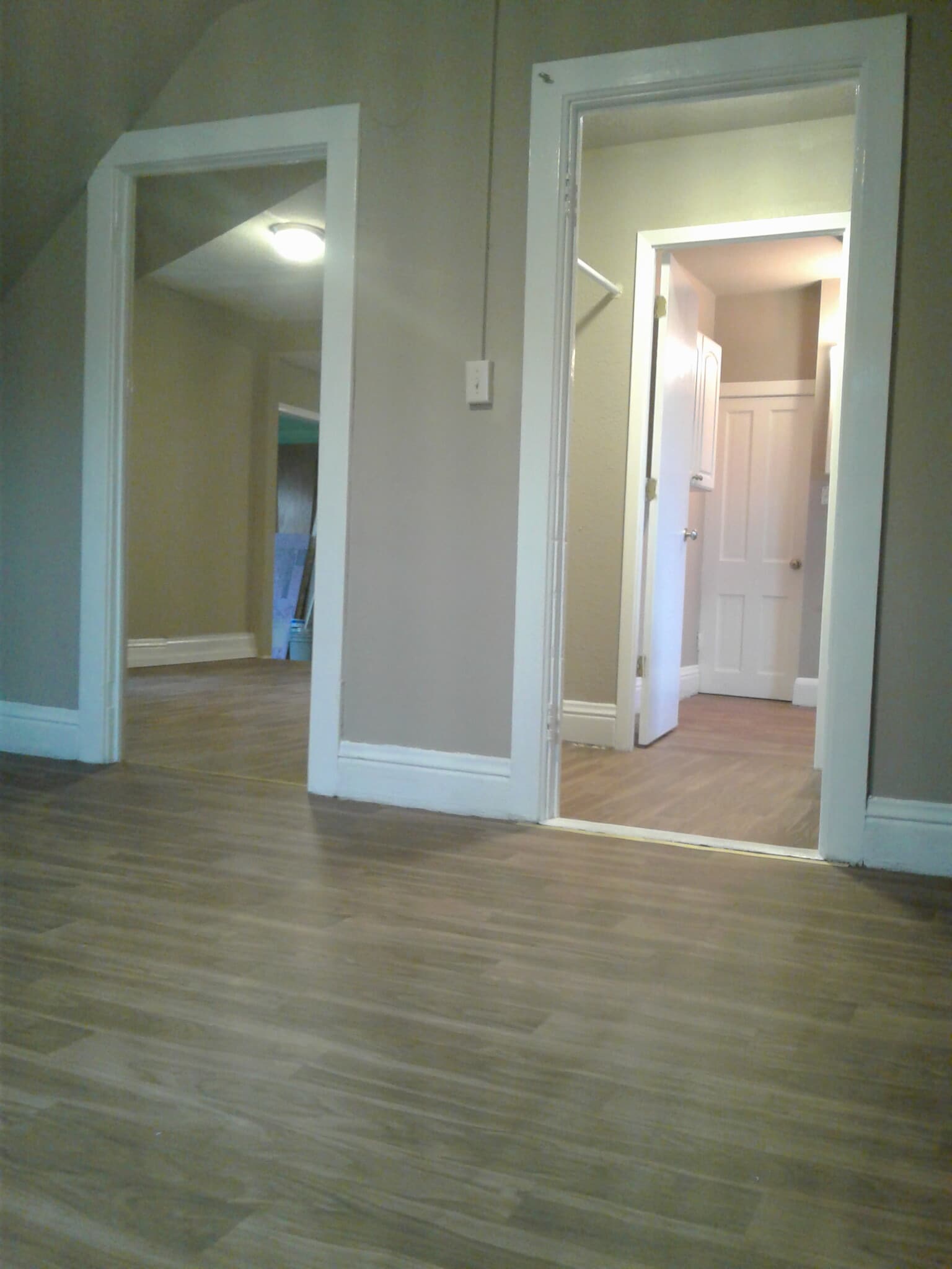 Looking from master into living room and closet. - 673 Dale Street North