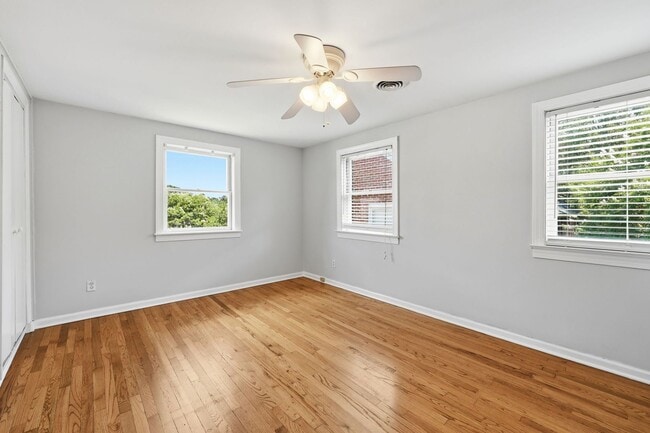 Building Photo - Updated 2BR Condo | Walk to Village District + Private Deck!