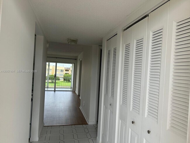 Building Photo - 6090 NW 64th Ave