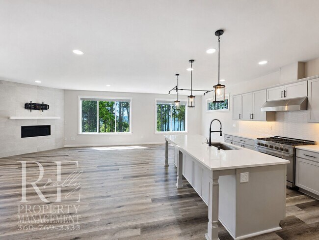 Building Photo - Luxury Poulsbo Retreat with Water Views, Covered Deck & Designer Finishes