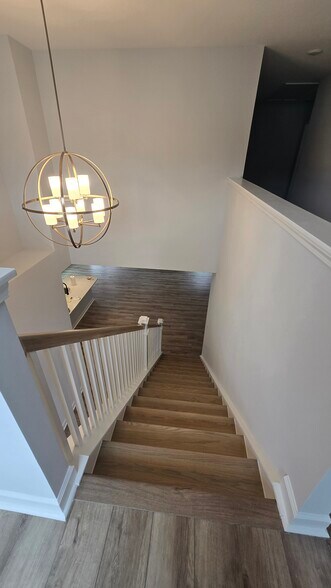 Staircase as seen from 2nd floor - 55 Paper Birch Trl