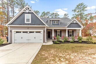 Building Photo - Southern Pines Gem! Pool and fenced backyard!
