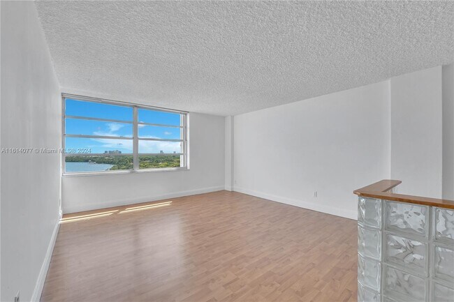 Living Room - Great views to the bay and to the park - 150 SE 25th Rd