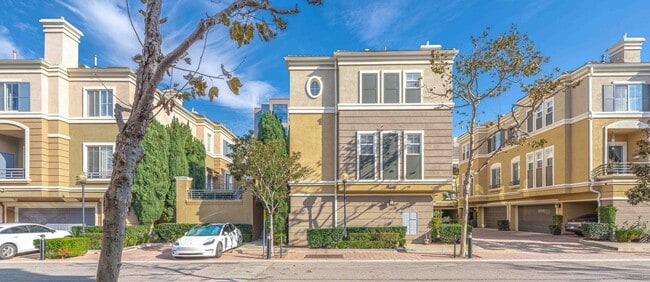 Building Photo - Stunning Upgraded Tri-Level Condo in South Coast Metro’s Exclusive Vantage Community