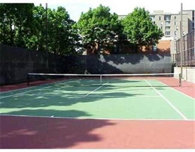 Building Photo - Short walk to Longwood! Steps to T! Large 1 bedroom w/enclosed porch! Garage parking incl.