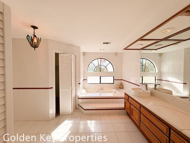Building Photo - Welcome to this stunning 4-bedroom, 3-bathroom home located in the desirable La Costa neighborhoo...