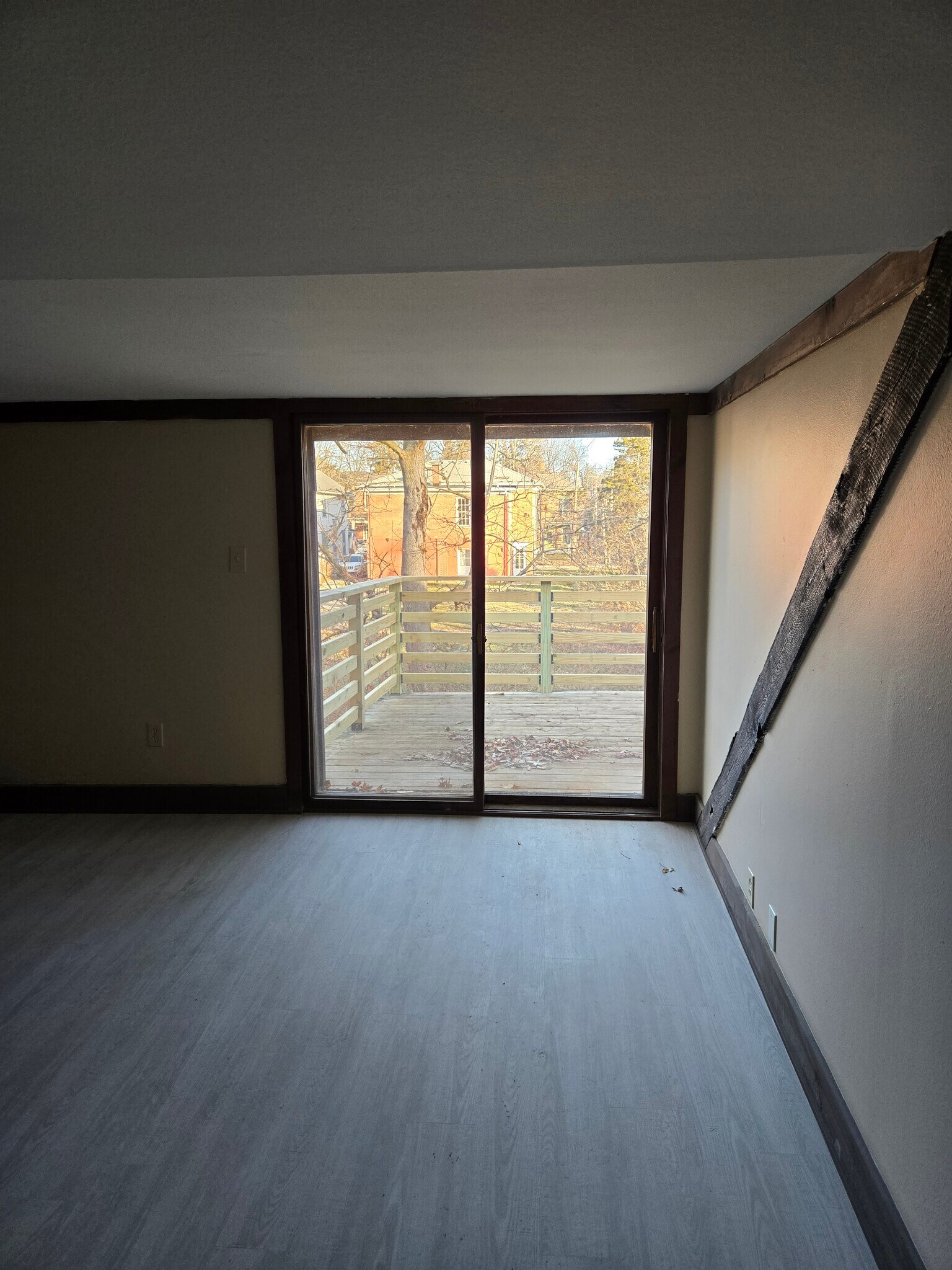 master bedroom with access to elevated deck - 60 W Winter St