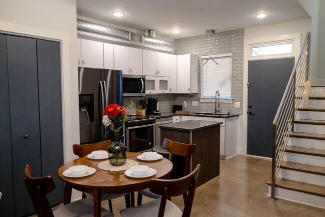 Building Photo - Brand new townhome offers the perfect blen...