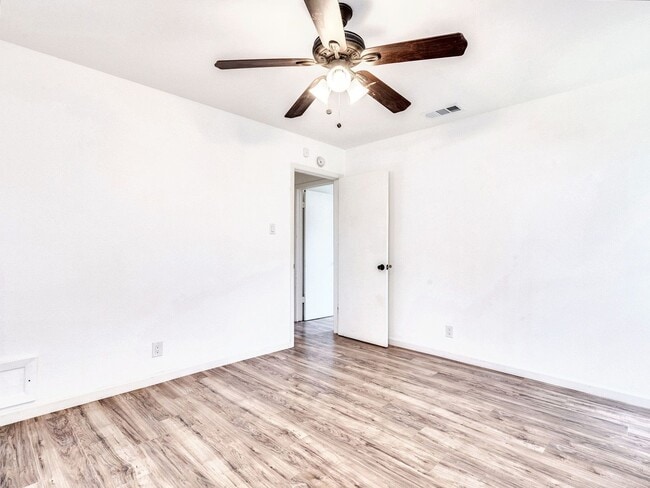 Building Photo - Charming 4BR / 2BA Home Featuring Fireplace, White Cabinets & Big Tree