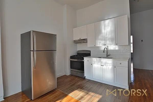 Primary Photo - 3 bedroom in BROOKLYN NY 11206