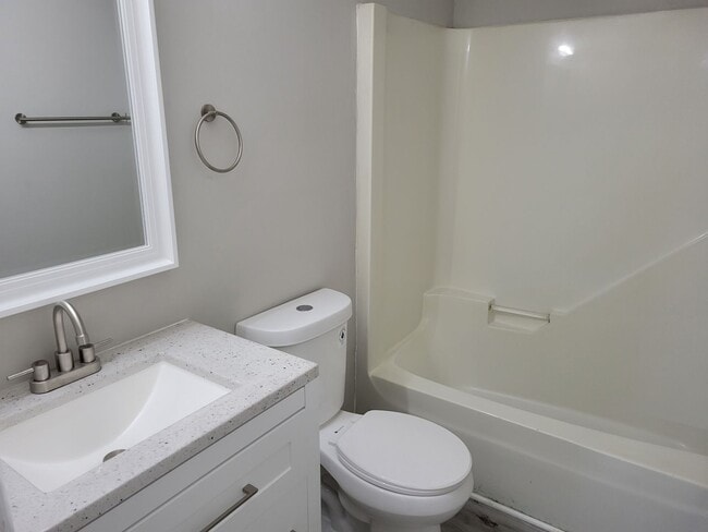 Building Photo - Renovated Duplexes with Great Specials!