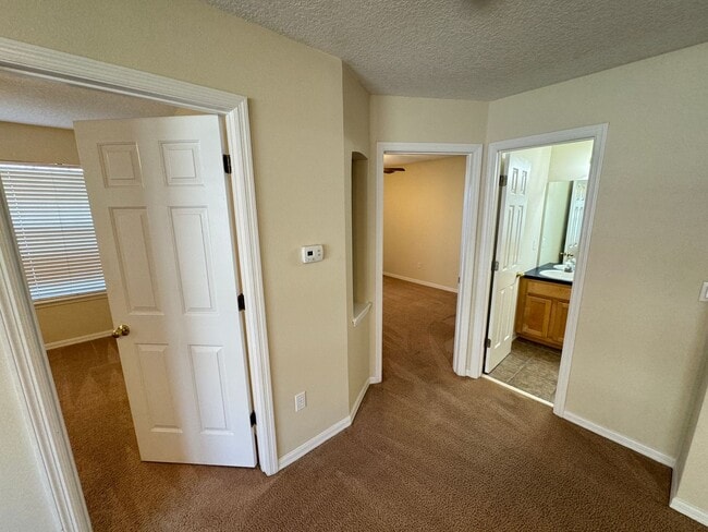 Building Photo - Spacious 4-Bedroom Home with Private Pool and Modern Comforts