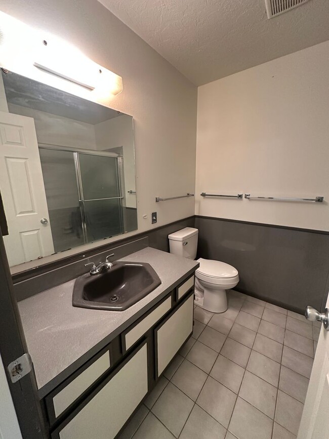 Building Photo - Spacious, three level, 4 Bed 2.5 bath Townhome in Ammon right behind the Walmart on Hitt.