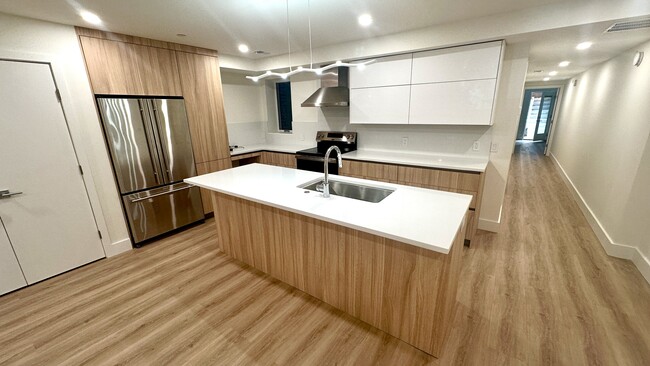 Kitchen with three door refrigerator - 1644 Irving St NW