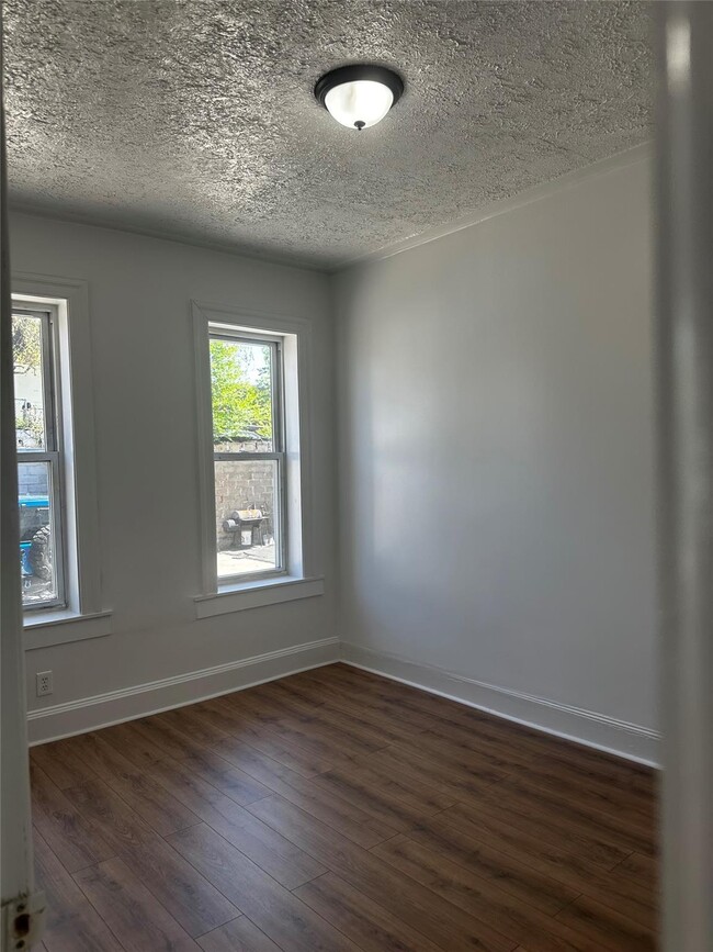 Building Photo - 26-33 96th St