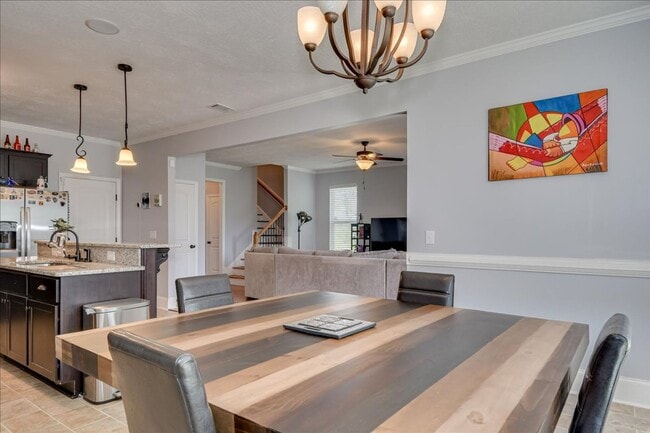 Building Photo - 4 bed, 2.5 bath home on corner lot with 2 car garage and fenced in back yard