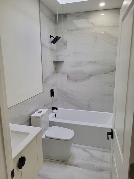 2nd floor full bath with skylight - 1164 Atwood Rd