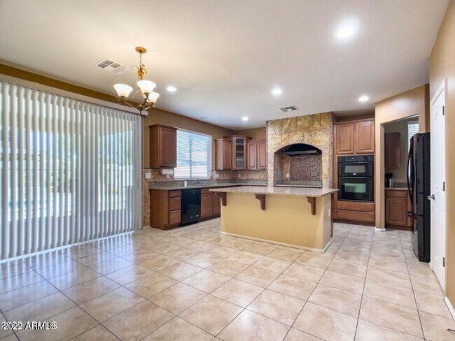 Building Photo - 2406 W Sienna Bouquet Pl
