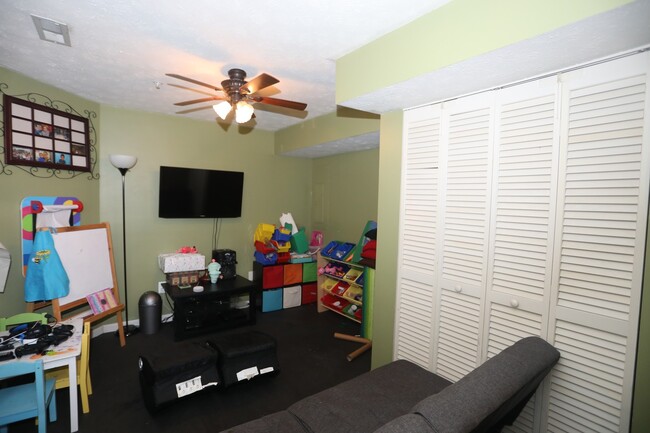 Building Photo - Available -Spacious 2 Car Garaged Townhome...