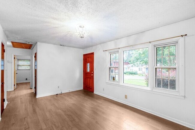 Building Photo - Space to Live, Room to Dream, 4BR/2BA with flex space, office, 2 car dettached garage and ample p...