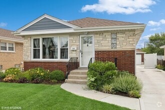 Building Photo - 7335 N Nora Ave