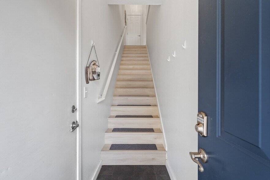 One flight up - 10800 SE 17th Cir
