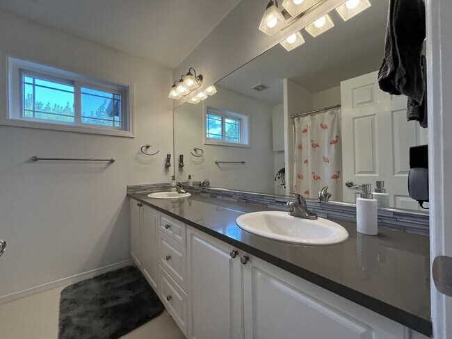 Building Photo - Spacious 3-Bedroom Home with Two Living Areas, Private Balcony, Fireplace & Attached 2-Car Garage