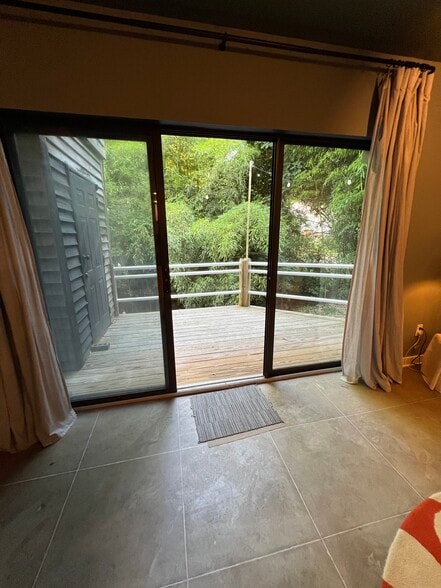 back deck off living area - 130 E Longview St