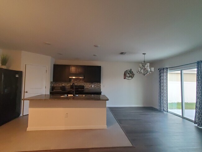 Building Photo - 6776 Wagon Trail St