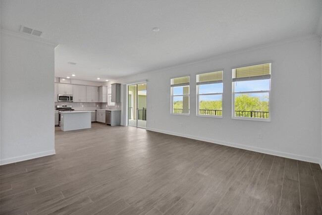 Building Photo - Stunning 4/3 in Gated Dora Parc! Water Views!
