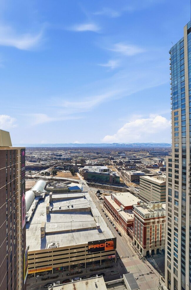 Building Photo - 35th Floor Downtown Denver Condo | 1 Bed | Private Balcony | Mountain Views
