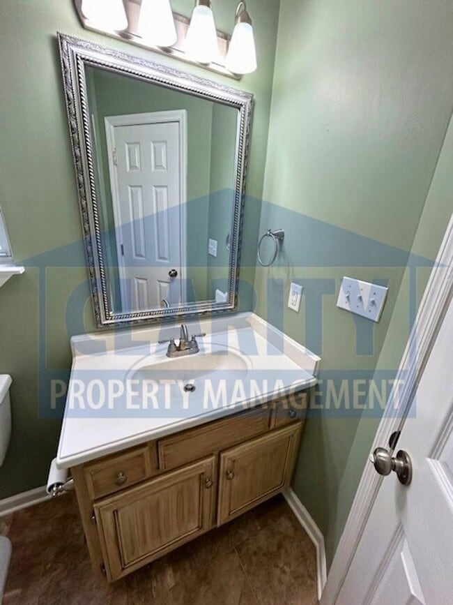 Building Photo - Three bedroom with attached garage!