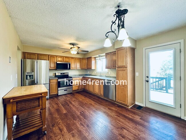 Building Photo - Beautiful, Split-Level Olathe Home w/ Stainless Steel Appliances and a Finished Basement!