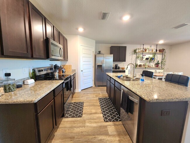 Building Photo - ALMOST NEW!! Exquisite 4 Bedroom, 2 Bath R...