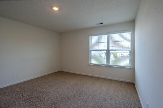 Building Photo - Newly built 3 bedroom and 2.5 bath home with garage.