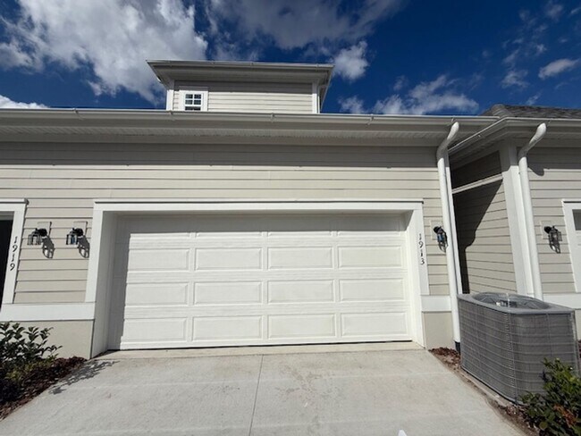 Building Photo - Brand new construction 3 Bedroom Town Home in Island Village of Celebration