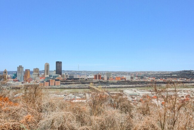 Building Photo - Available JULY 2026  - RENOVATED 3 Bedroom Home w/ Garage, City Views + MORE!