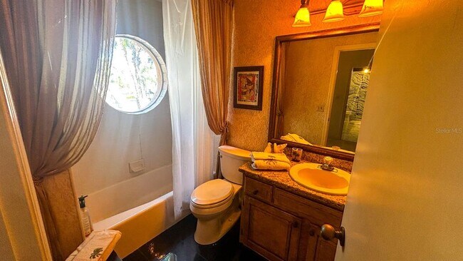 Building Photo - 1635 Royal Palm Dr S