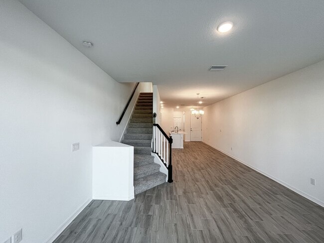 Building Photo - Townhome with garage, excellent location, community pool and more