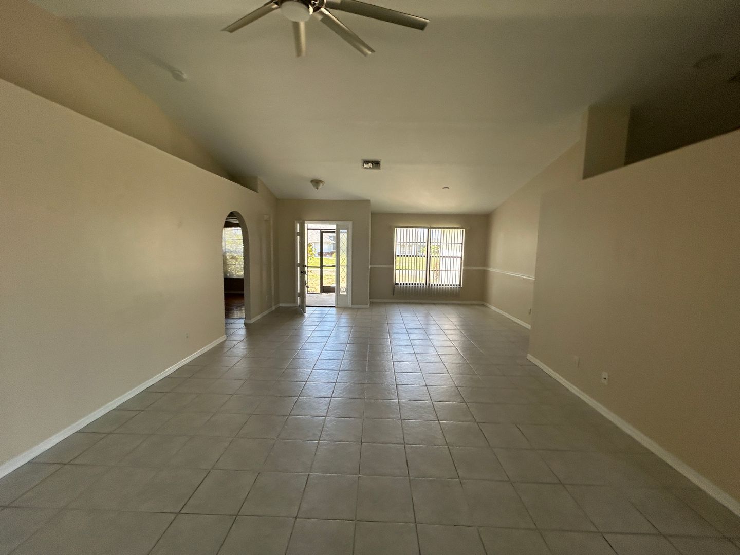 Building Photo - Freshly painted interior 2/2  spacious home on fresh water canal