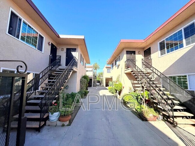 Building Photo - 7039-7039 Miles Ave