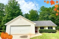 Building Photo - Welcome to this charming 3-bedroom, 2-bath...
