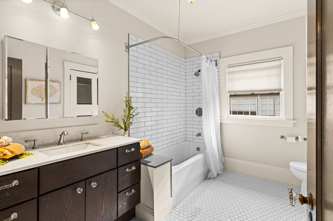 extra long, extra deep tub and spacious bathroom with great light and storage - 2835 Georgia St