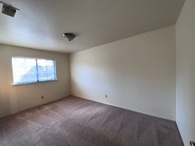 Building Photo - Freshly painted home with new carpet. 3 Ca...