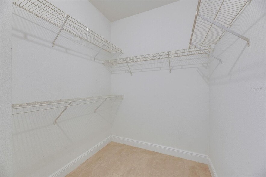 Walk-in closet - 13016 Sanctuary Cove Dr