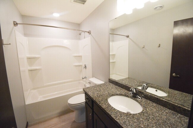 Building Photo - Remodeled 4-Bedroom Home for Rent with Garage & Deck