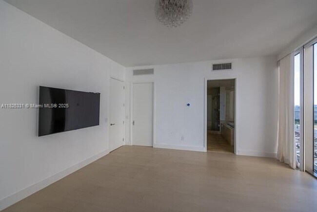Building Photo - 9701 Collins Ave